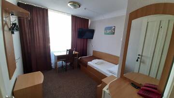 Стандартный одноместный номер с общей ванной комнатой в Отеле Tourist Hotel